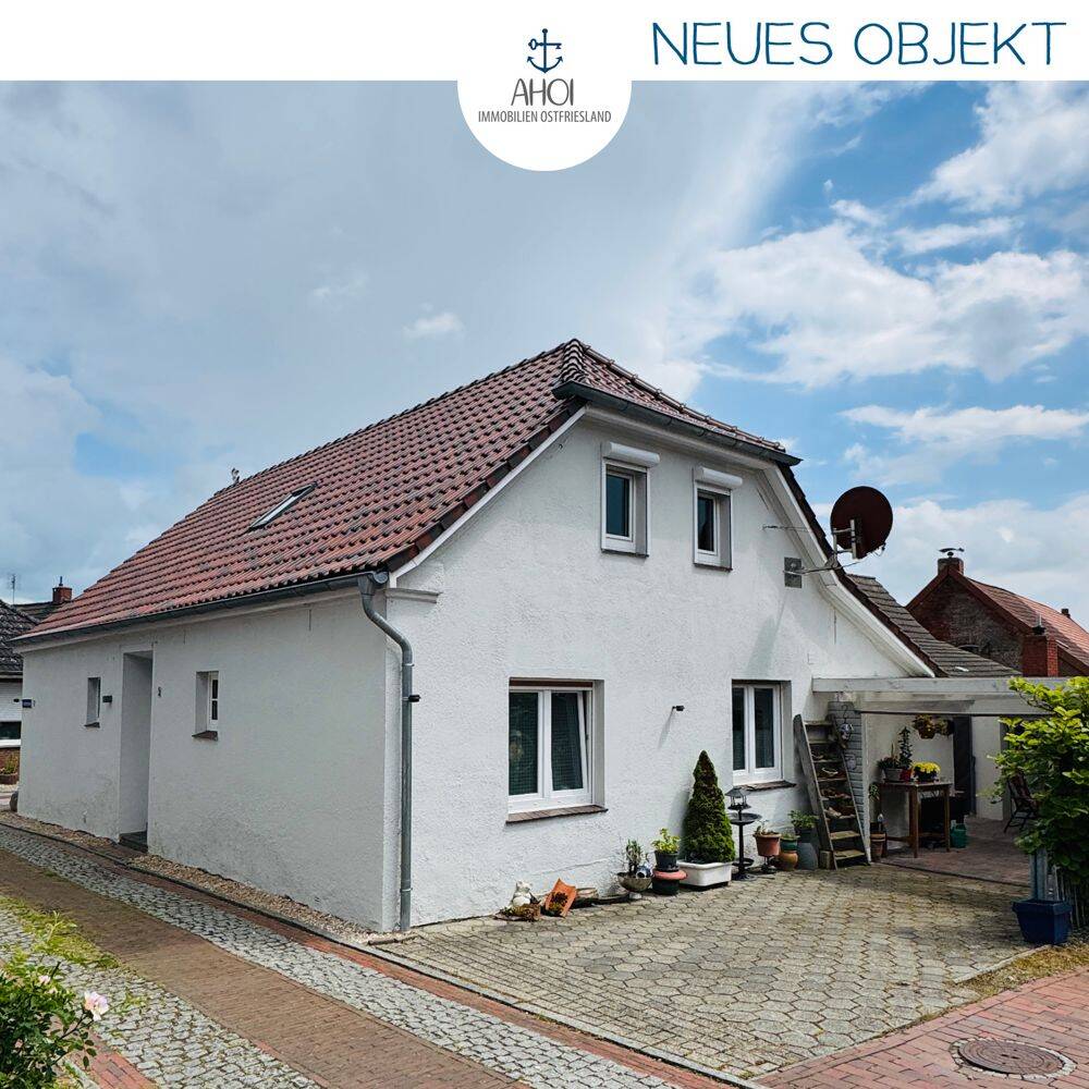 Nordsee-Flair inklusive: teilmodernisiertes Einfamilienhaus mit Garage in Warftenlage, 26736 Krummhörn