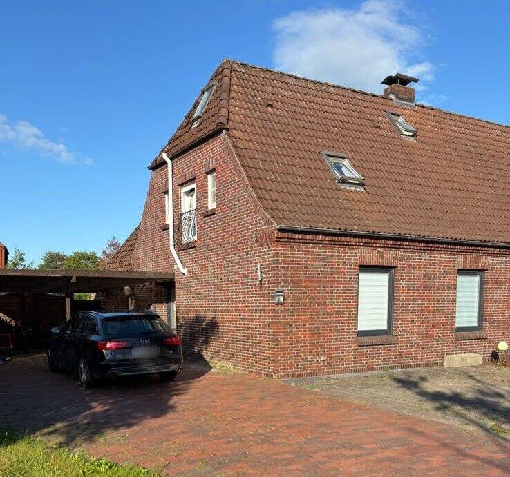 Stilvolle Doppelhaushälfte mit ca. 130 m² Wohn- und Nutzfläche, Carport, Garten und neuerer Heizung, 26345 Bockhorn