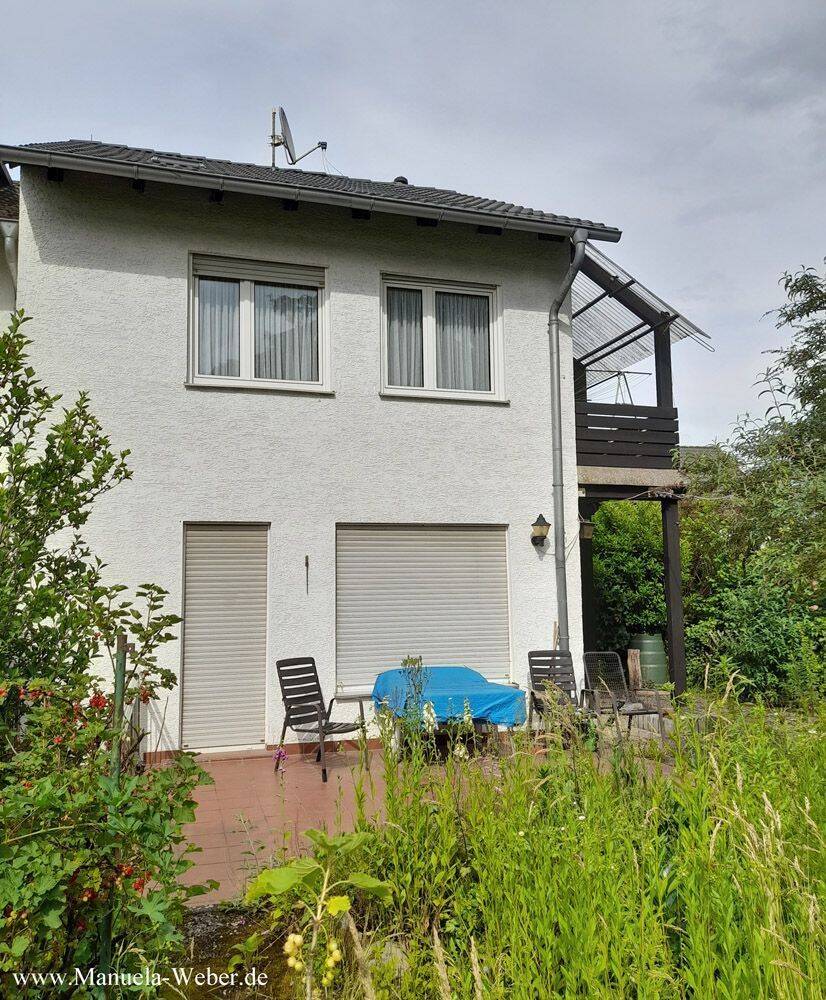 Reihenendhaus mit großem Garten und Garage in in guter Lage in Dreieich-Dreieichenhain, 63303 Dreieich