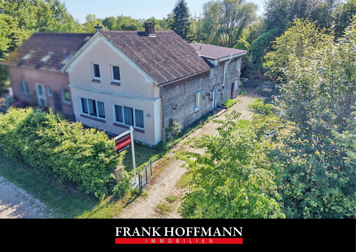 Einfamilienhaus mit vielseitiger Nutzungsmöglichkeit auf großzügigem Grundstück in Heidgraben, 25436 Heidgraben