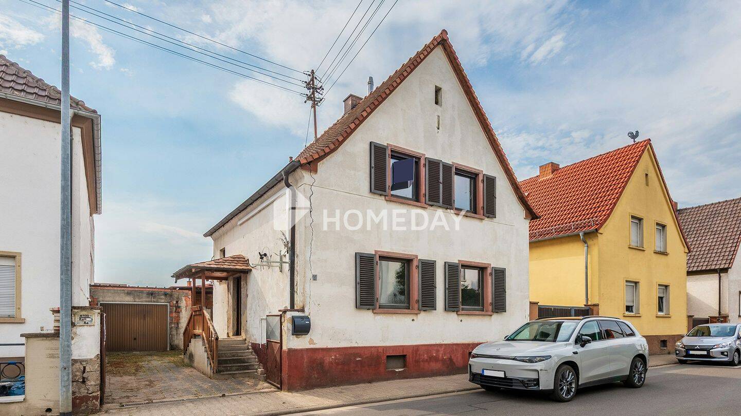 Großzügiges Einfamilienhaus mit 5 Zimmern, Garten, Terrasse & Baulandanteil in Fußgönheim, 67136 Fußgönheim