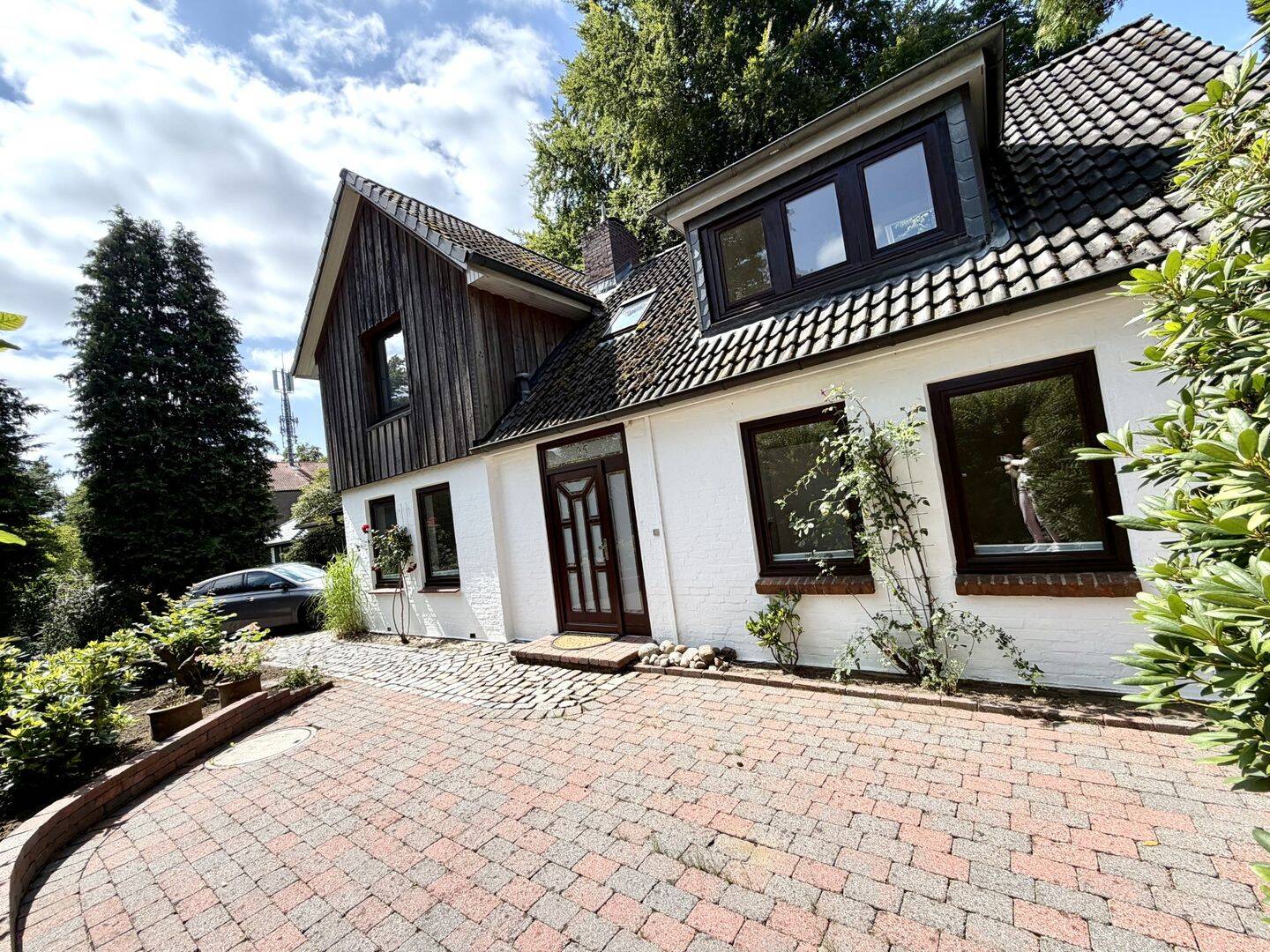 1 A Lage in Großhansdorf – wunderschön begrüntes Einfamilienhaus mit großem Garten und Garage zu verkaufen, 22927 Großhansdorf