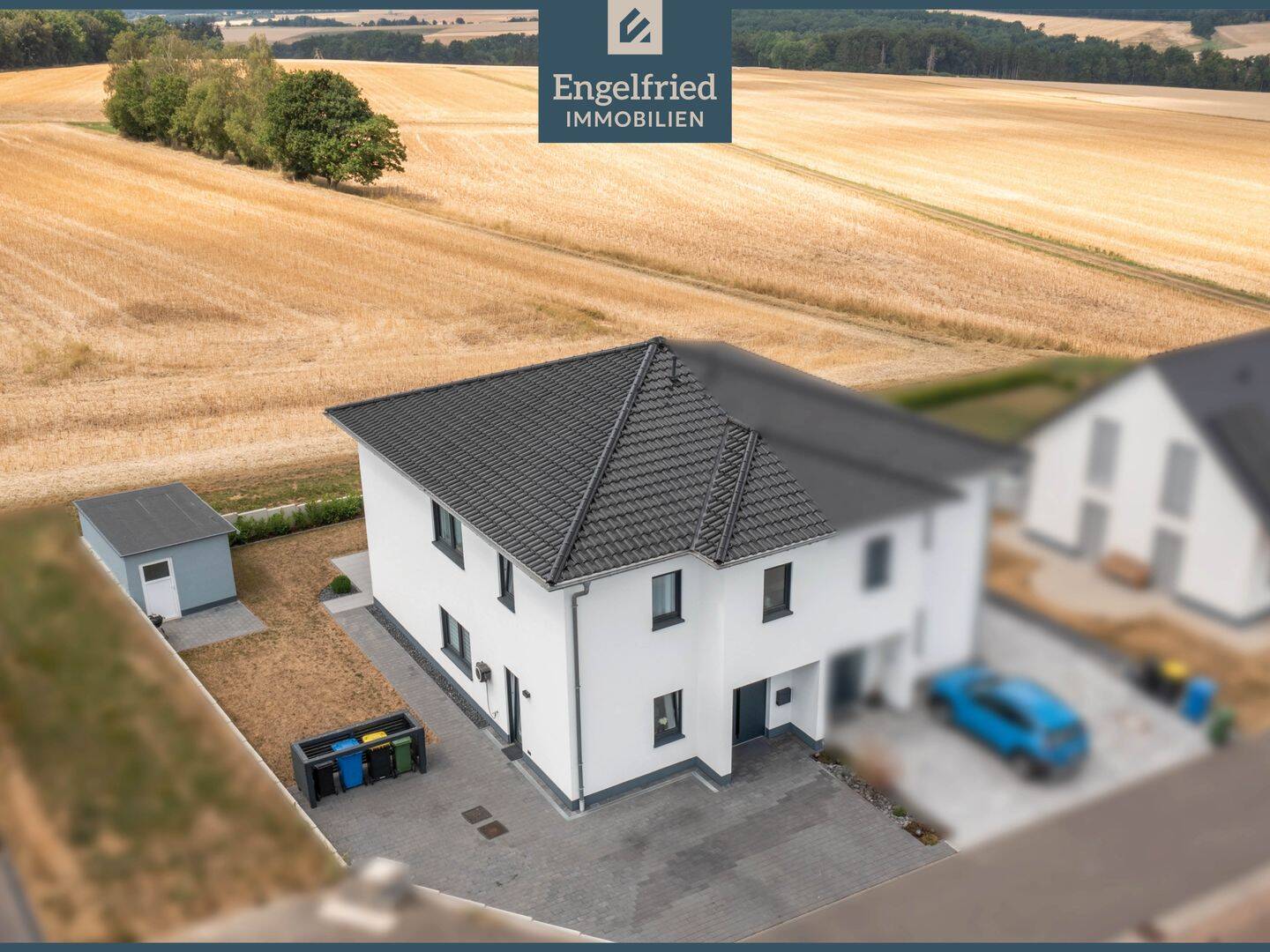 Nahezu neuwertige Stadtvillenhälfte in malerischer Lage am Ortsrand, 55469 Altweidelbach