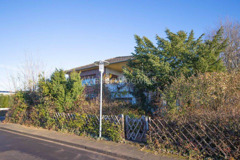 Familienhaus mit Potenzial: freistehend, zentral gelegen und bereit für neue Ideen, 53340 Meckenheim