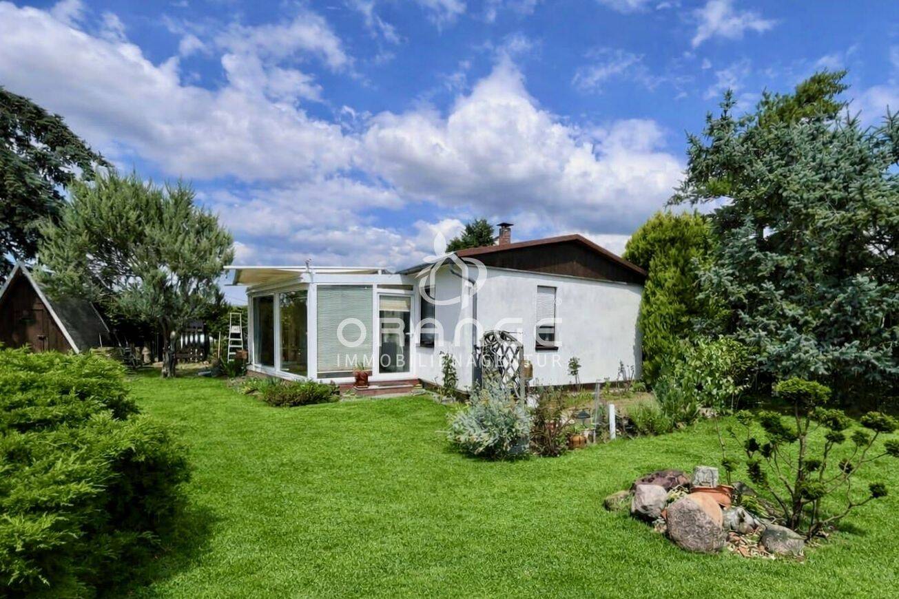 *** Wohnen im Grünen – Gepflegter Bungalow mit Wintergarten in idyllischer Naturlage ***, 4862 Mockrehna