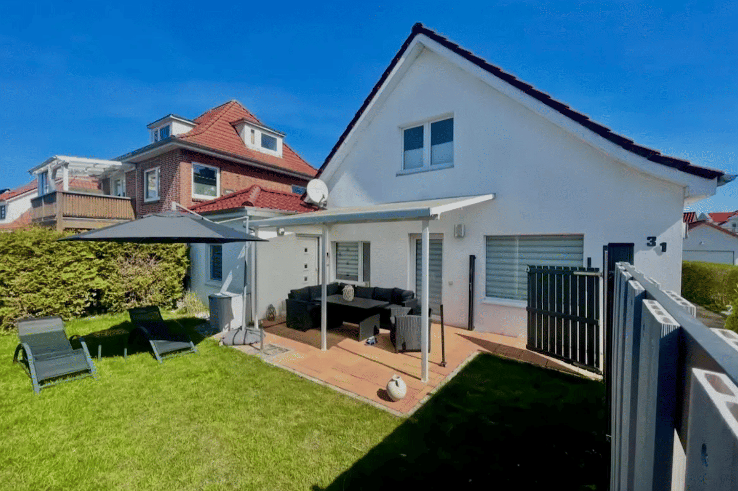 Strandnahe Erdgeschosswohnung mit privatem Garten, Südwest-Terrasse und eigenem Stellplatz, 23683 Scharbeutz