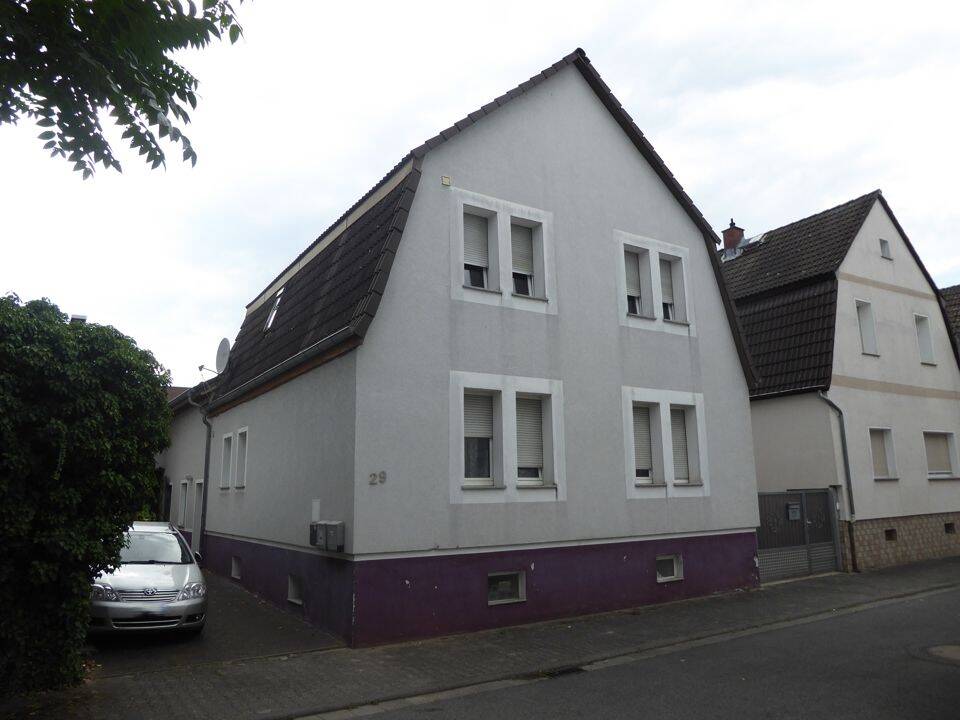 Attraktives Zweifamilienhaus mit Garten – zentral und vielseitig nutzbar!, 65428 Rüsselsheim am Main