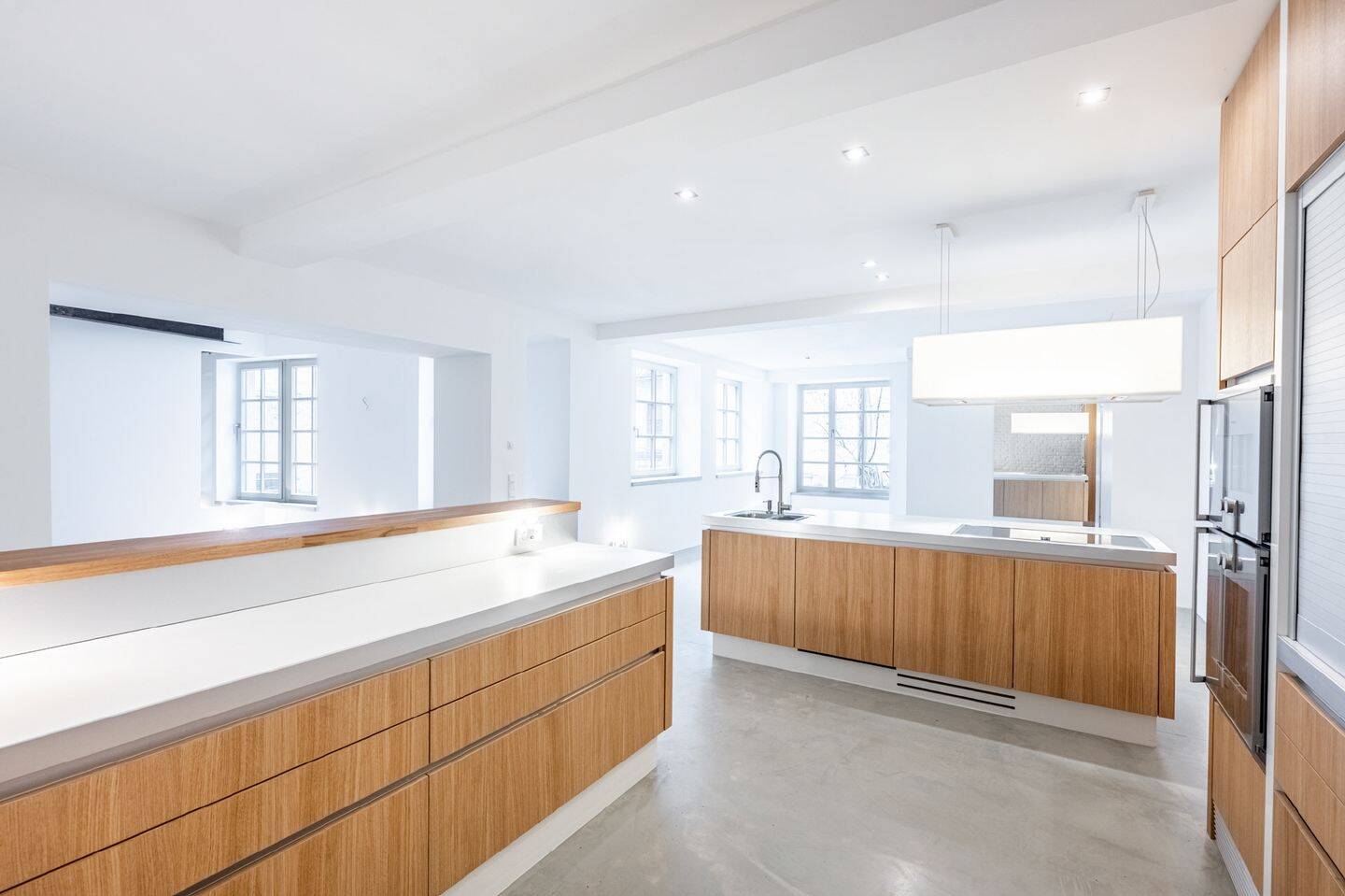 AIGNER – Modernisierte ca. 190 m² Wohn-/Nutzfläche – Gartenloft im Glockenbachviertel