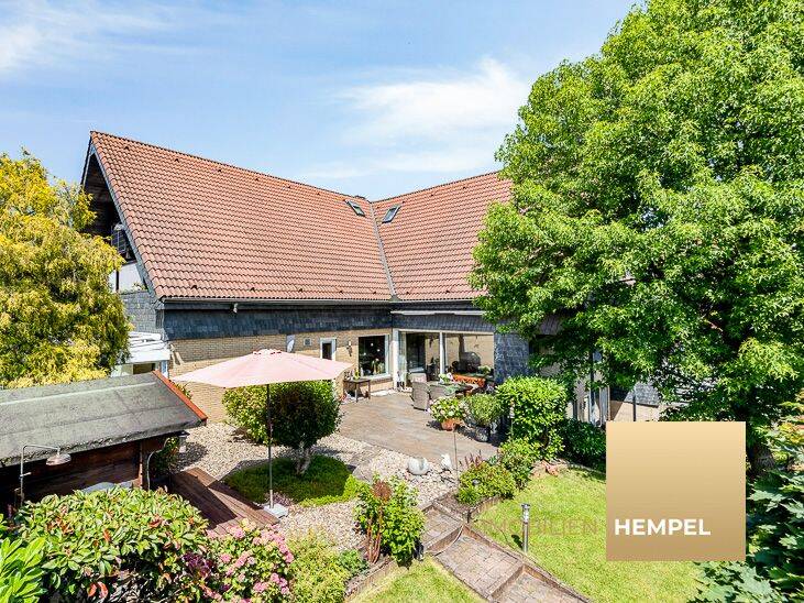 HAUS IM HAUS  –  Wohnen wie im Einfamilienhaus, charmante Eigentumswohnung mit großem Garten DU-Rahm