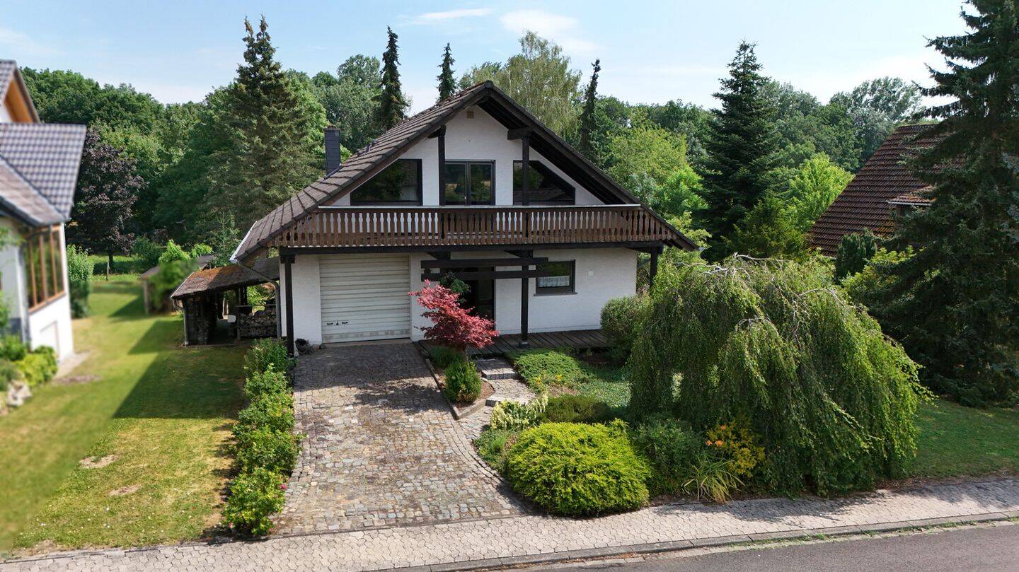 Charmantes Einfamilienhaus mit großem Garten, Kachelofen und vielseitigen Nutzungsmöglichkeiten, 55595 Winterbach