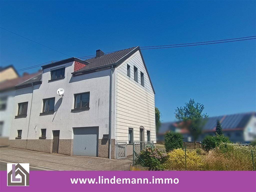 Einseitig angebautes Einfamilienhaus mit schönem Grundstück, 66589 Merchweiler