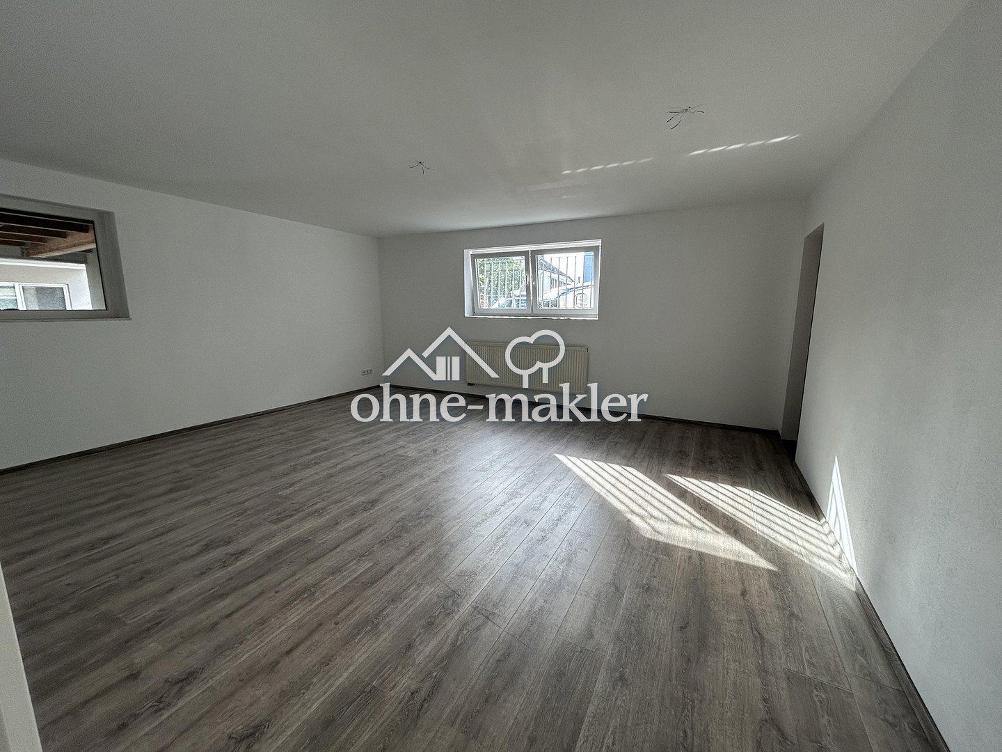 Helle Souterrainwohnung mit EBK & Stellplatz, 63773 Goldbach