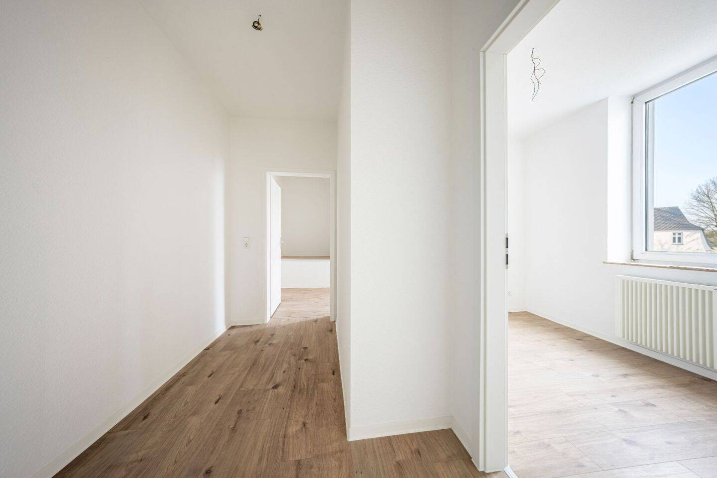 Modernisierte 4-Zimmer-Wohnung mit exklusivem Garten und Ausbaupotenzial