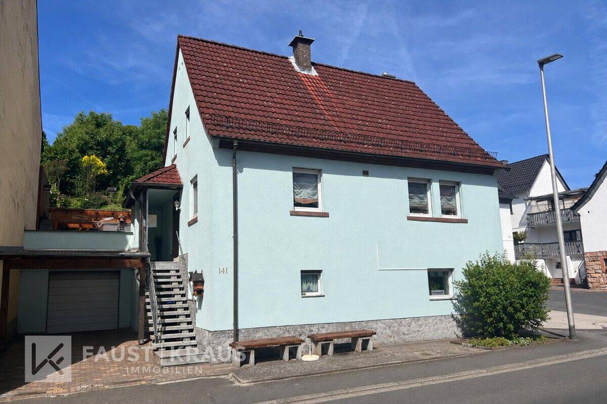 Gepflegtes Wohnhaus mit großem Grundstück, Garage, Carport und vielseitigen Nutzungsmöglichkeiten, 63879 Weibersbrunn