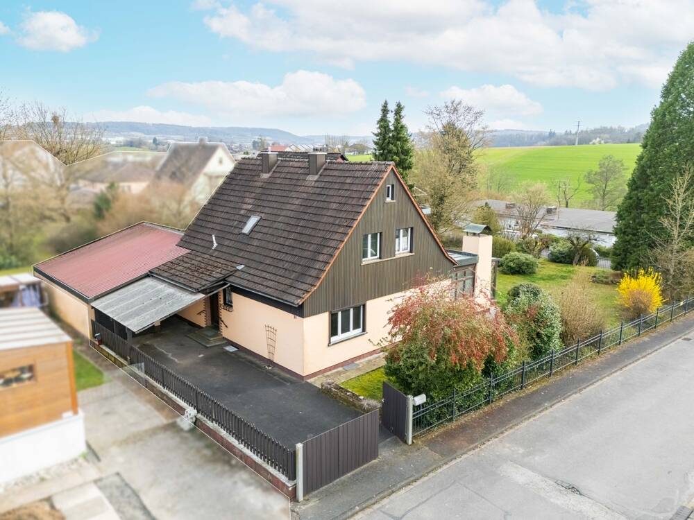 Ihr neues Zuhause: Familienhaus mit großem Garten und Poolpotenzial, 97840 Rothenbuch