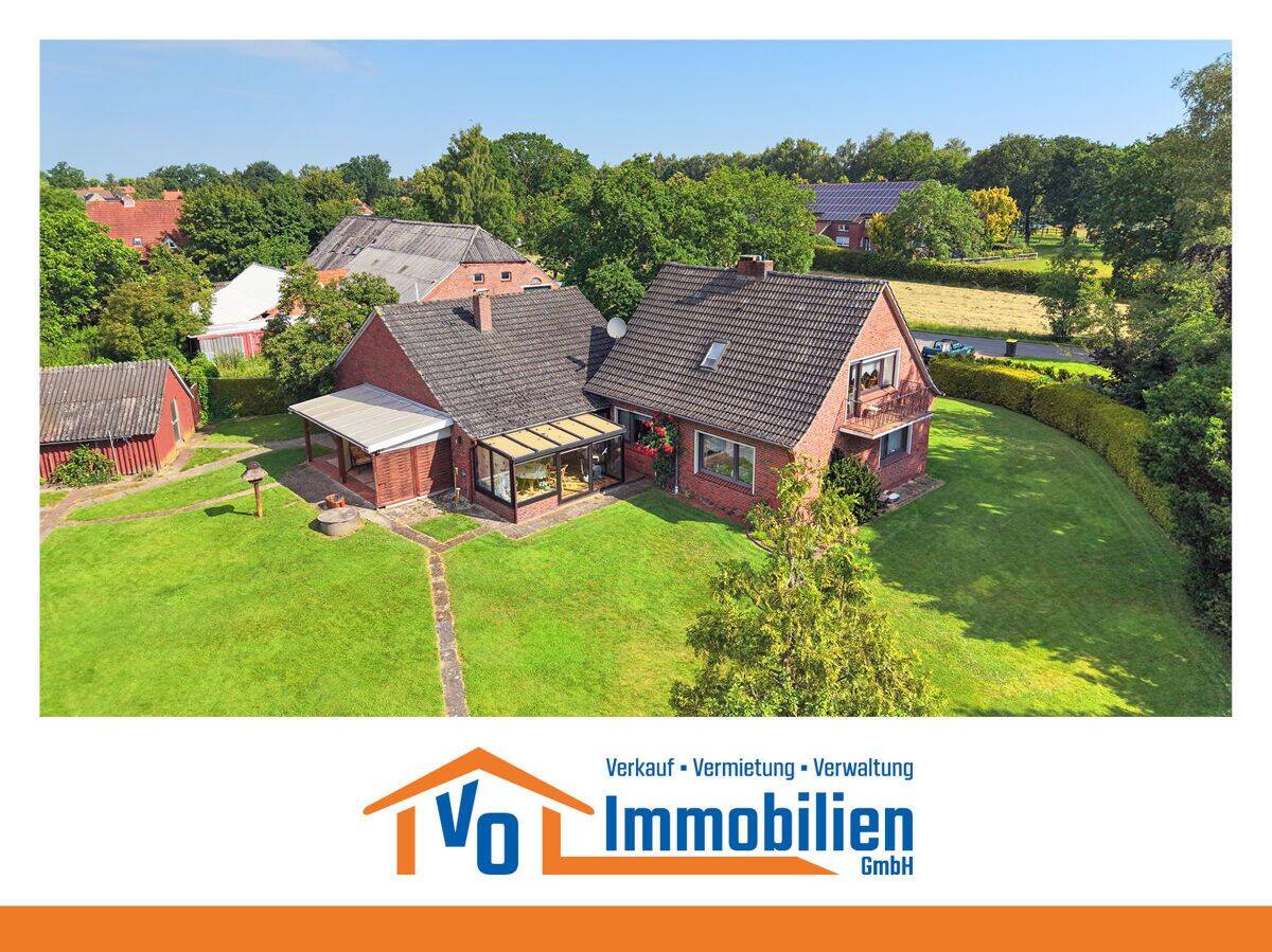 Einfamilienhaus mit Doppelgarage und Wintergarten auf weitläufigem Grundstück in Strackholt, 26629 Großefehn