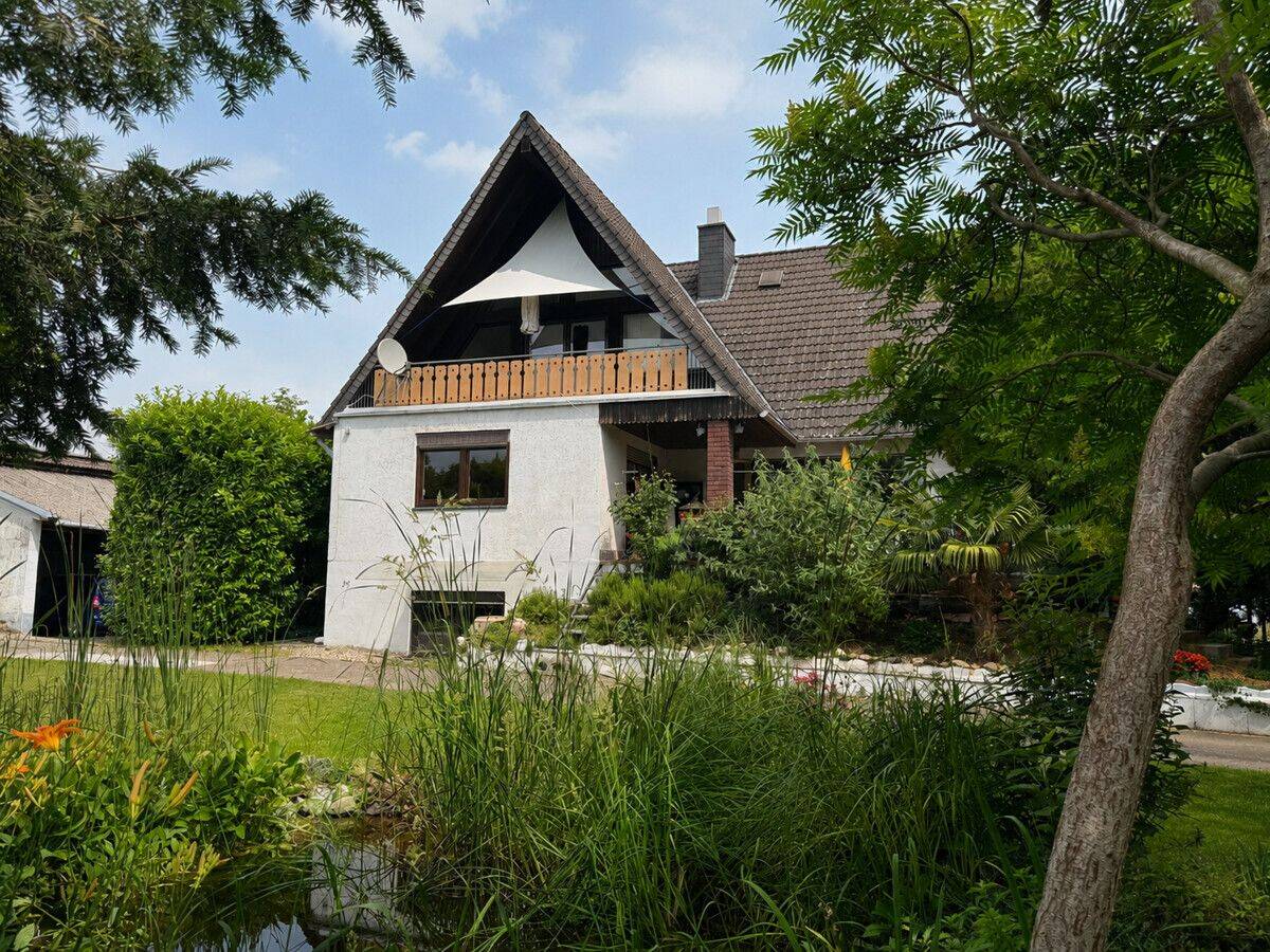 Ein- bis Zweifamilienhaus mit Nebengebäuden auf 2.902 m² Grundstück, 67547 Worms (Innenstadt Weinsheim)