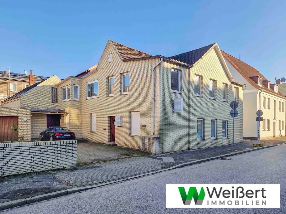 Vielseitig nutzbares Wohn- und Geschäftshaus mit ca. 518 m² Wohn- und Nutzfläche in zentraler Lage, 25524 Bekmünde