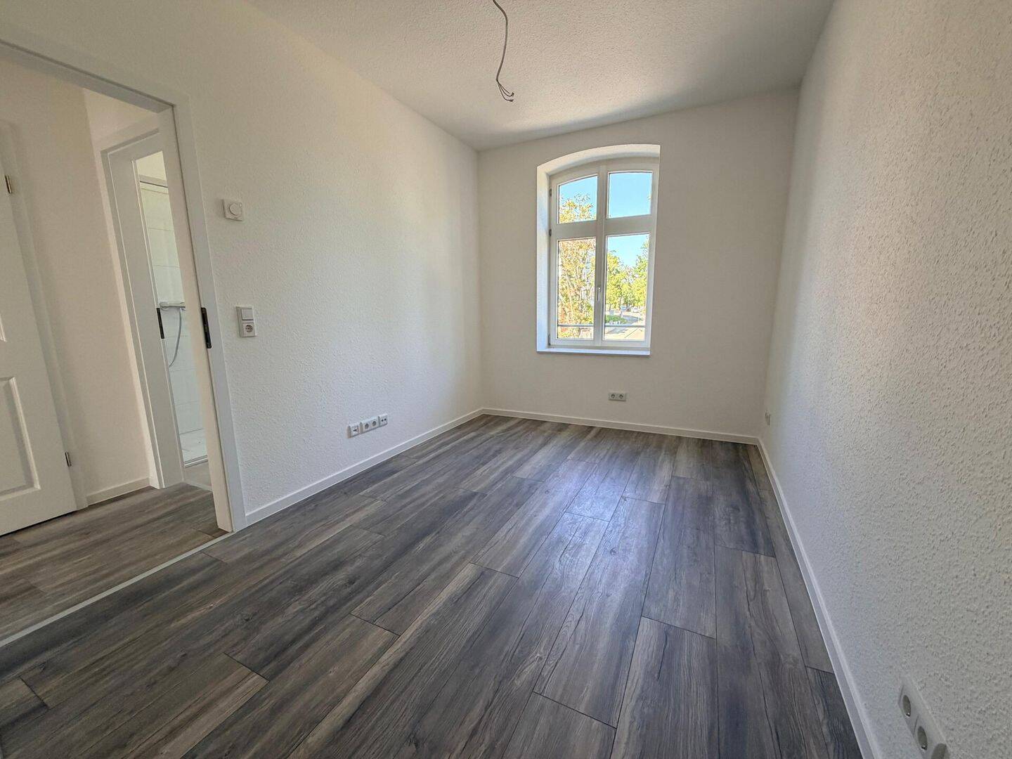 Kernsanierte Etagenwohnung in historischer Klinkerfassade – KfW 55 Standard – 6667 Weißenfels – Vorschaubild 4