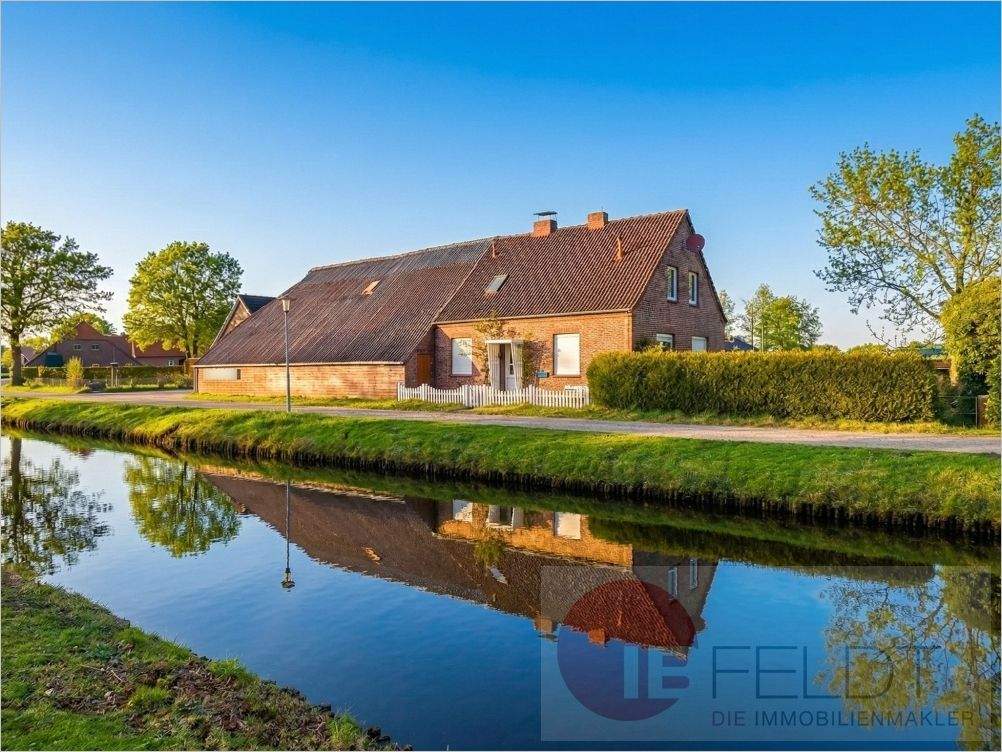 Kleinod zum Wachküssen mit Idylle pur: Fehnhaus direkt am Wasser mit Scheune, Garage & großem Garten, 26629 Großefehn