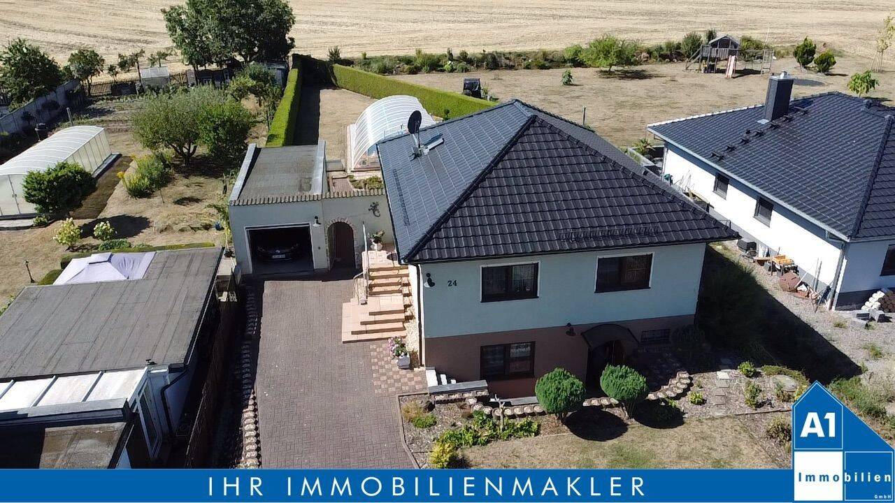 Ein Zuhause mit besonderen Möglichkeiten – Einfamilienhaus im Bungalowstil mit Garage, Pool, Gewerbeeinheit in Brachstedt, 6193 Petersberg