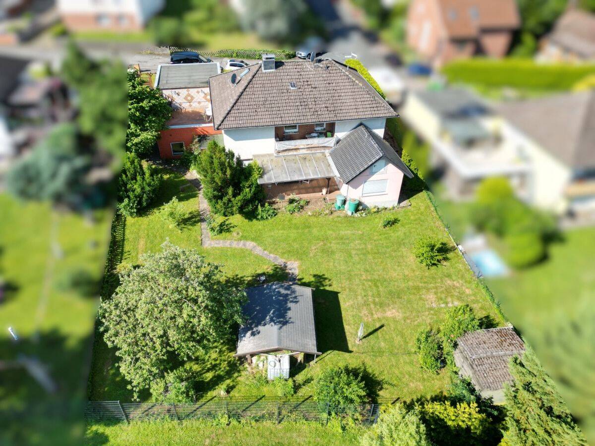 Einfamilienhaus mit Einliegerwohnung, Doppelgarage und Fernblick in Duingen – Marienhagen, 31089 Duingen (Marienhagen)