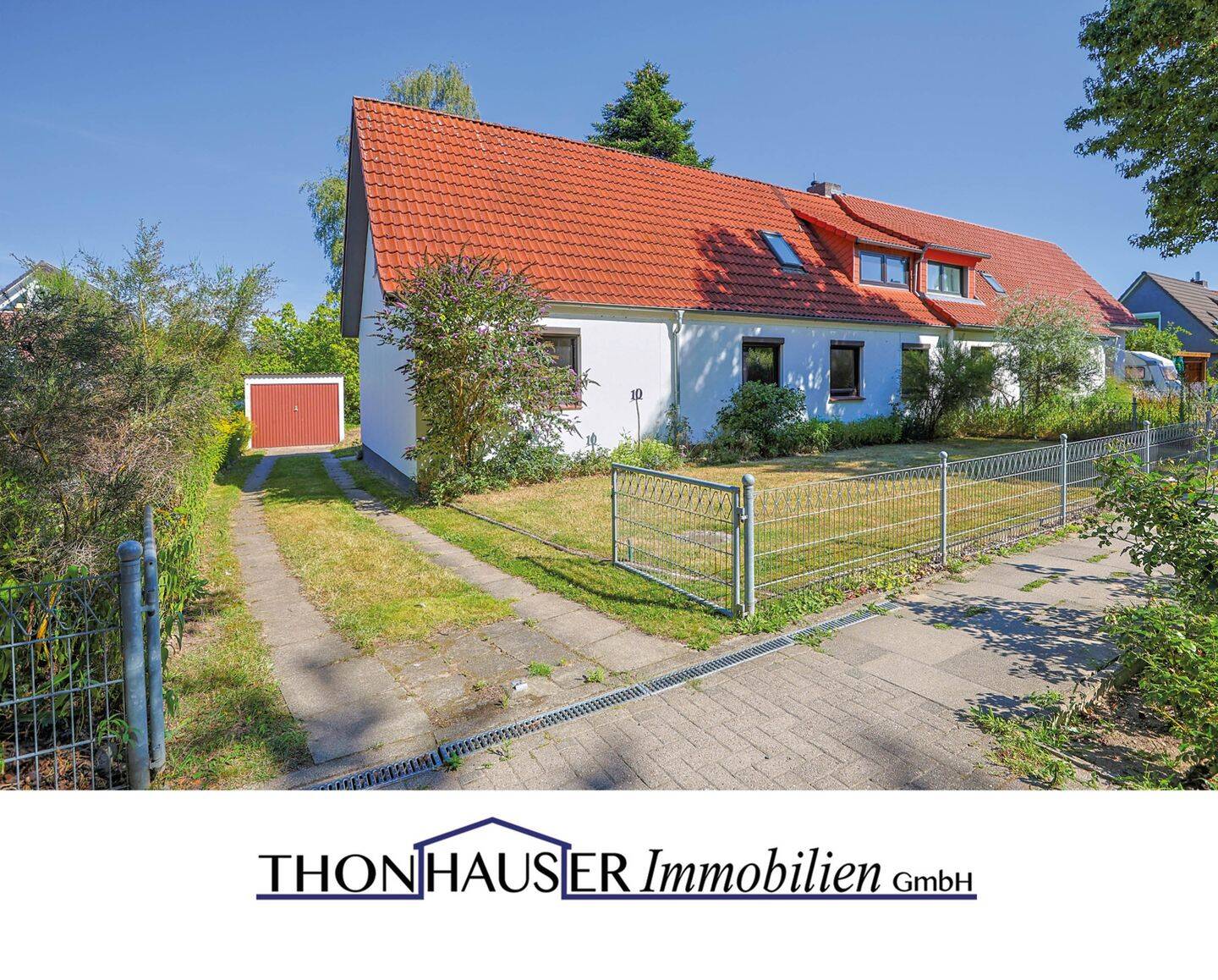 Doppelhaushälfte in 23843 Bad Oldesloe mit großzügigem Grundstück, Garage und Carport, 23843 Bad Oldesloe