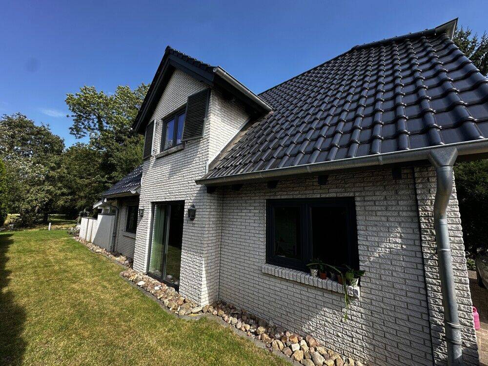Vier Zimmer, Kamin und Garten: Einfamilienhaus am Rellinger Ortskern, 25469 Halstenbek