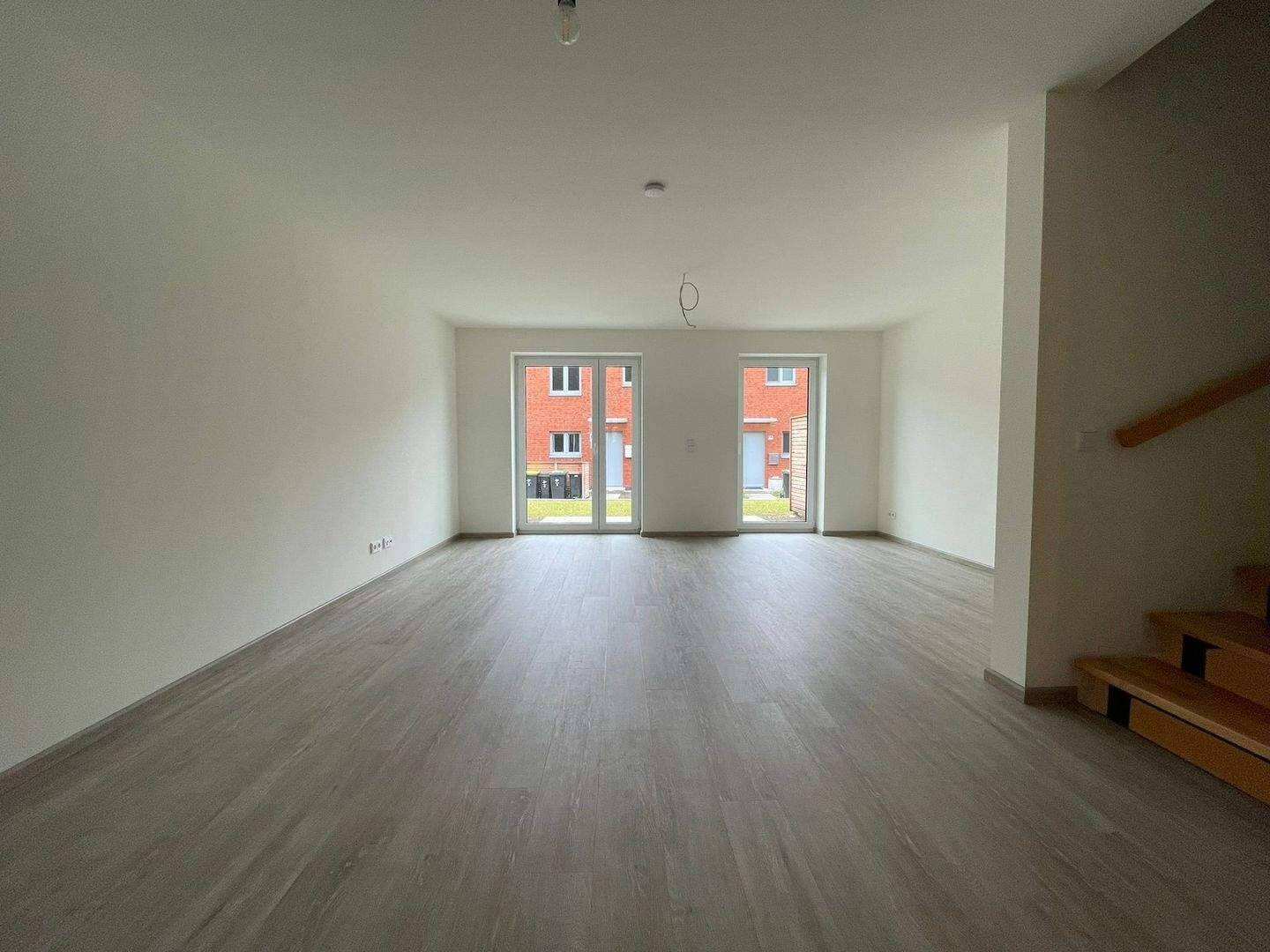 Familienfreundliches Mittelreihenhaus mit Dachstudio und eigenem Garten!, 24837 Schleswig