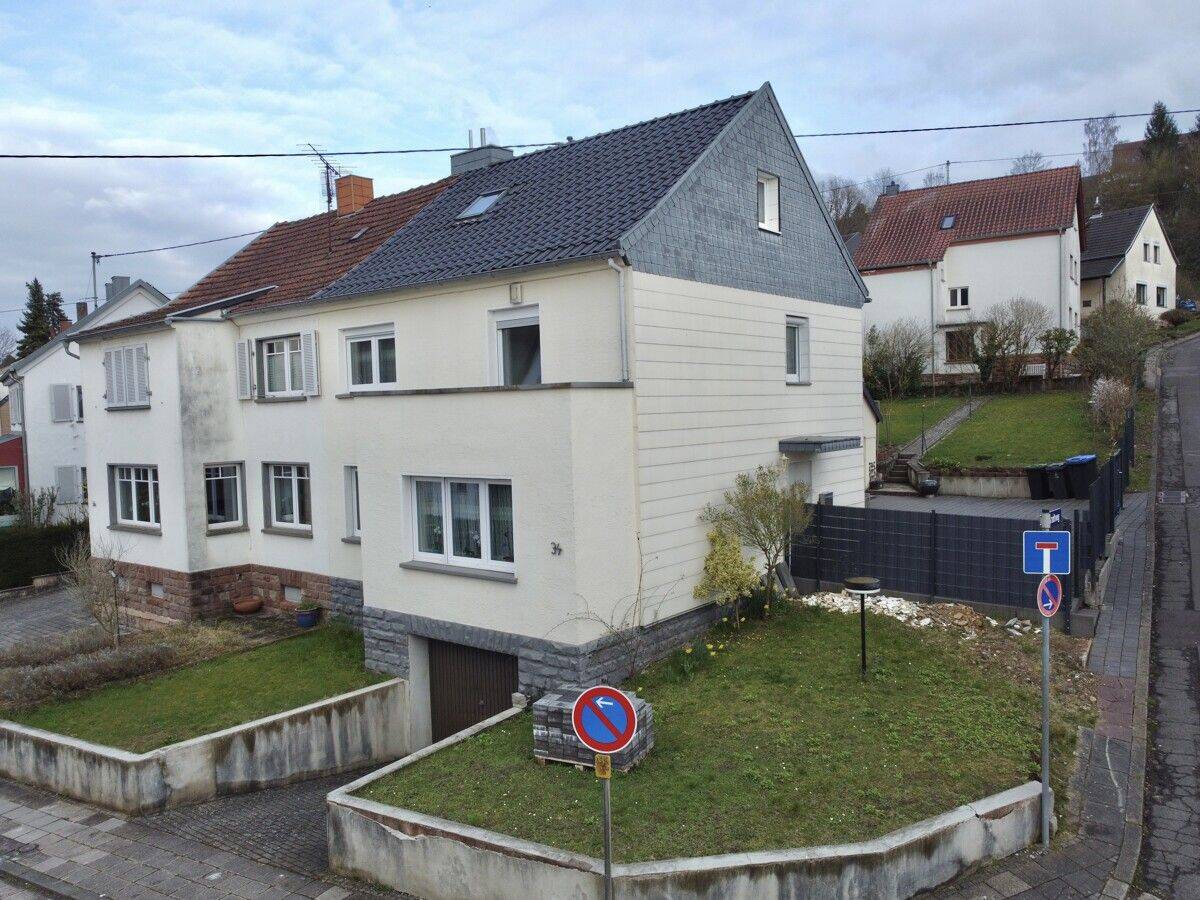 Gepflegtes Einfamilienhaus mit Garten & Garage in Merzig, 66663 Merzig
