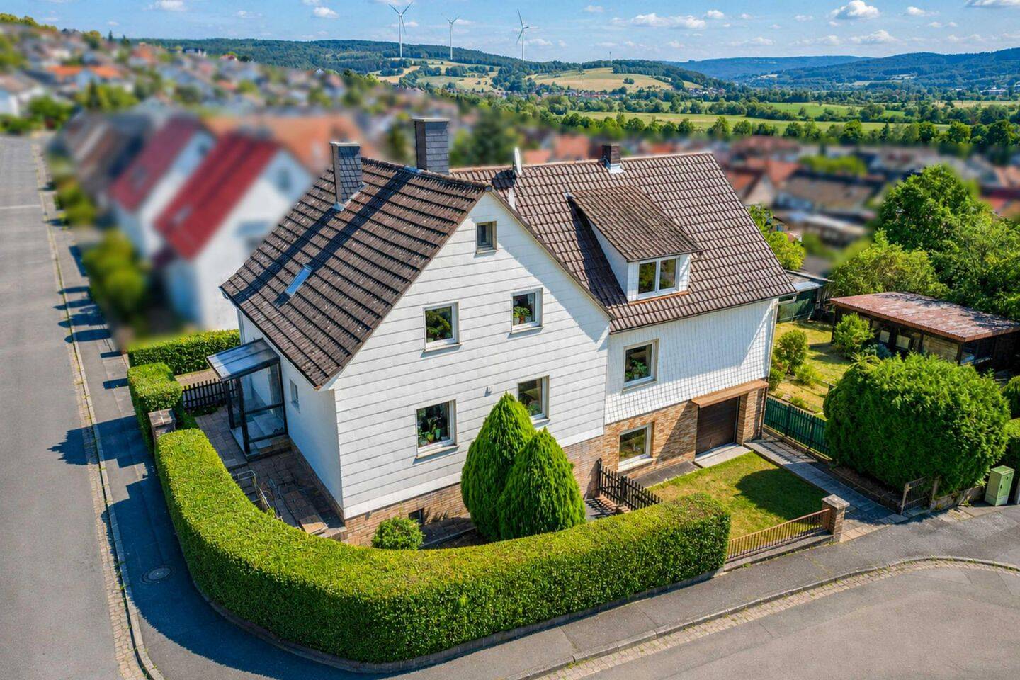 Eine Perle für Macher – Einfamilienhaus mit 179 m², Weitblick & 2 getrennten Wohnbereichen, 63607 Wächtersbach