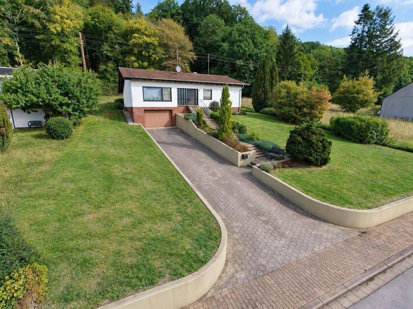 Gepflegtes Einfamilienhaus mit idyllischem Garten und sonniger Terrasse in Hausbach, 66679 Losheim am See