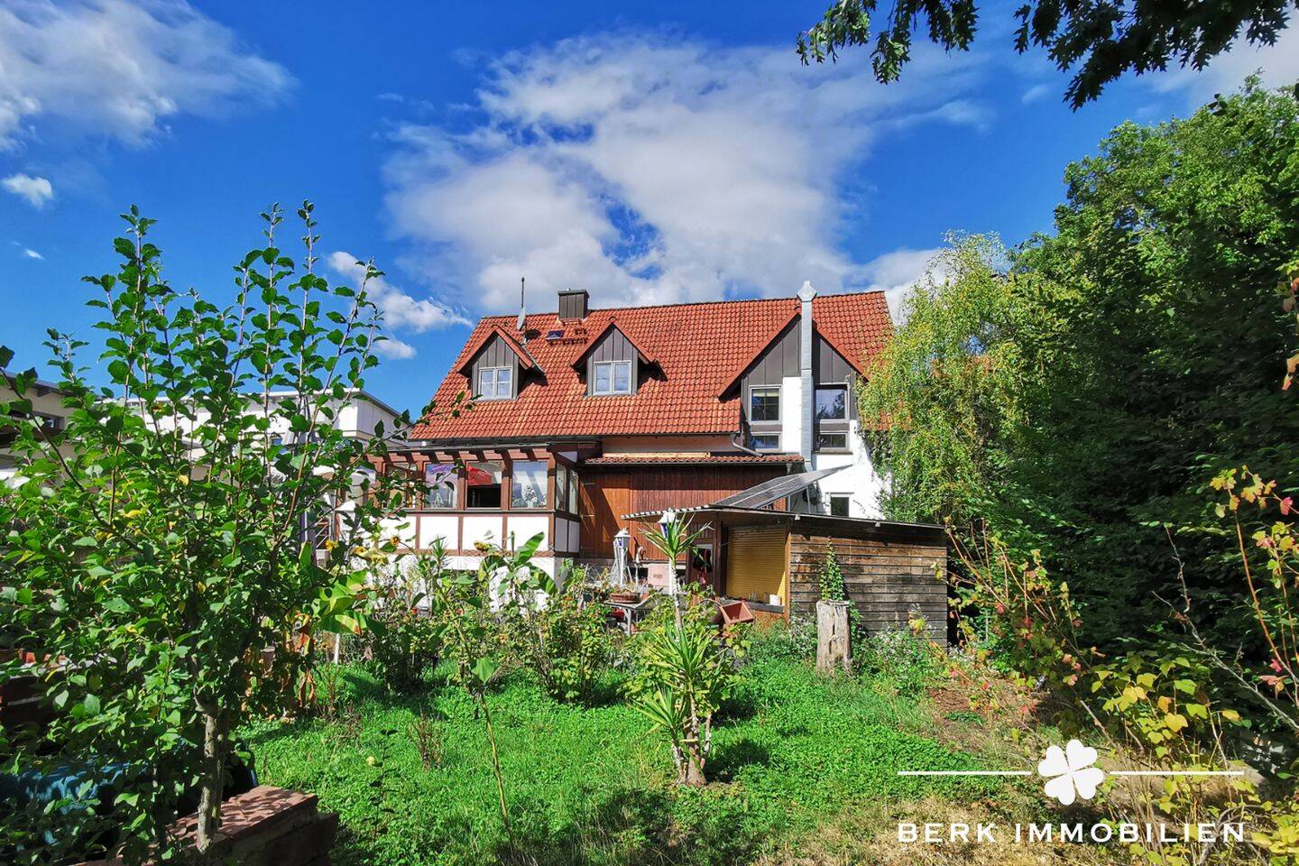 BERK Immobilien – Großzügiges Zuhause mit idyllischem Garten und lichtdurchflutetem Wintergarten, 63863 Eschau