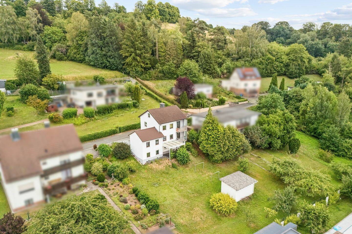 Charmantes Einfamilienhaus mit großem Grundstück in Weinbach, 35796 Weinbach