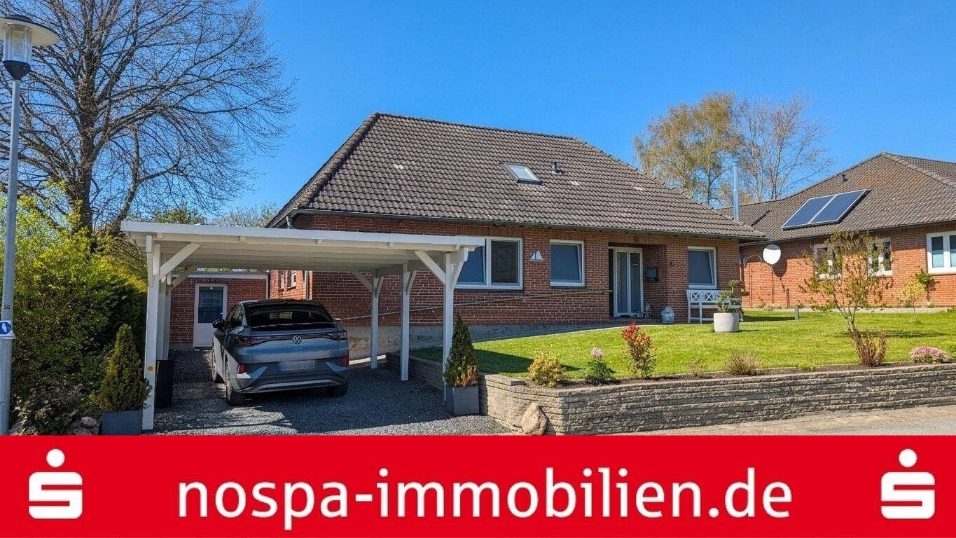 Gepflegter Bungalow mit Carport auf einem gepflegten Grundstück in Rabel, 24376 Rabel