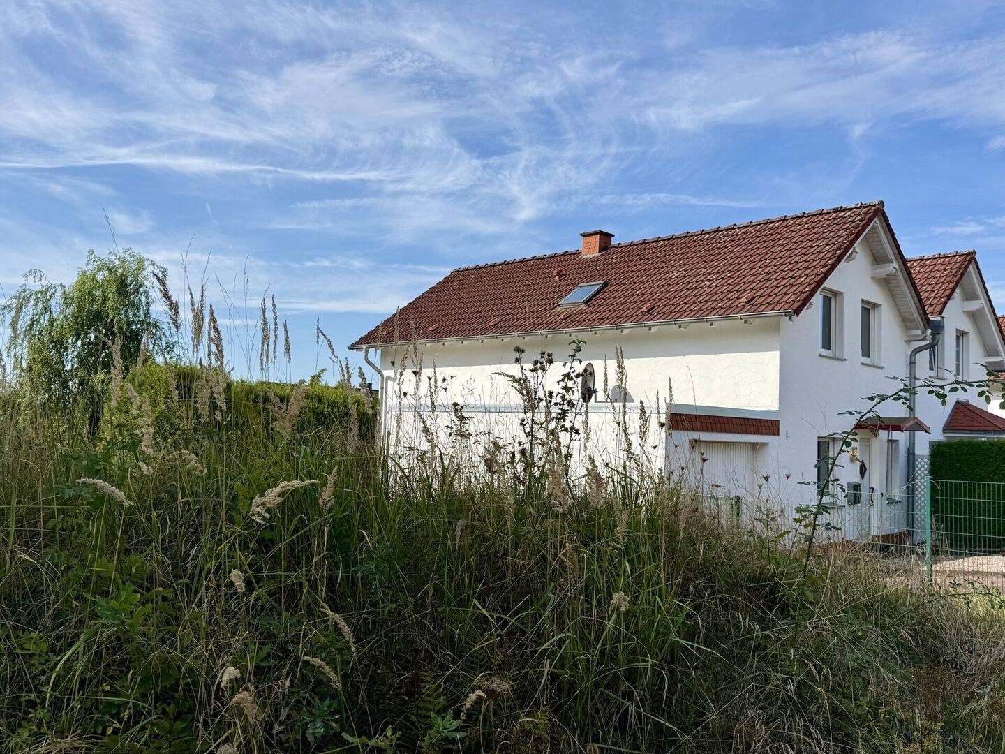 Fröndenberg: Gepflegte Doppelhaushälfte mit Garage in familienfreundlicher und stadtnaher Wohnlage!, 58730 Fröndenberg/Ruhr