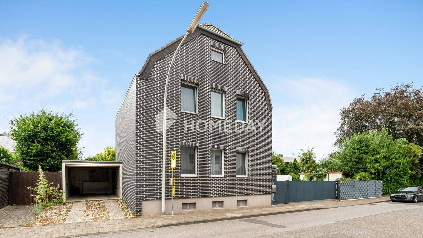 Modernisiertes Familienglück mit Garage, Garten, Terrasse und Einbauküche in Beckrath, 41189 Mönchengladbach