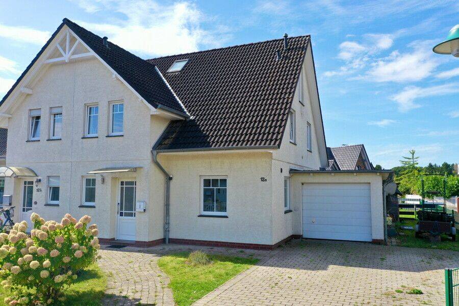 Charmante Doppelhaushälfte mit Garage in ruhiger Lage von Jeersdorf, 27383 Scheeßel