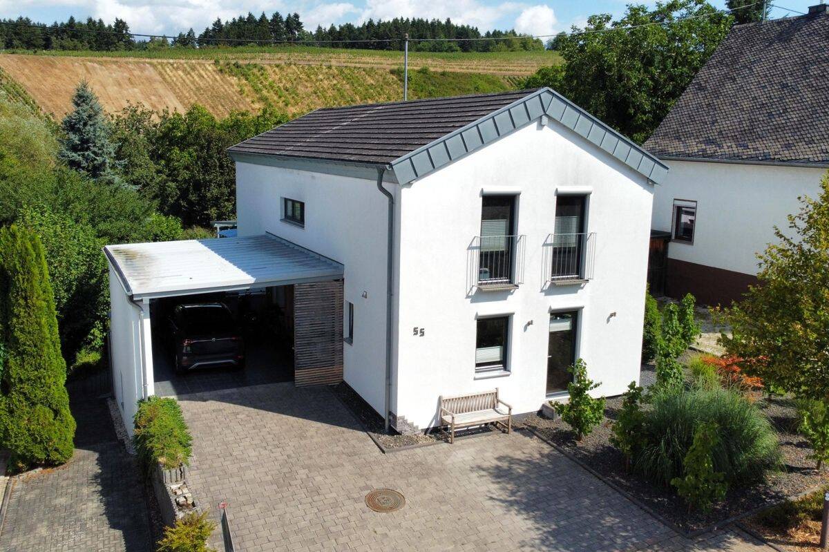 Modernes Einfamilienhaus mit Einliegerwohnung, Garten und Terrasse in Mertesdorf, 54318 Mertesdorf