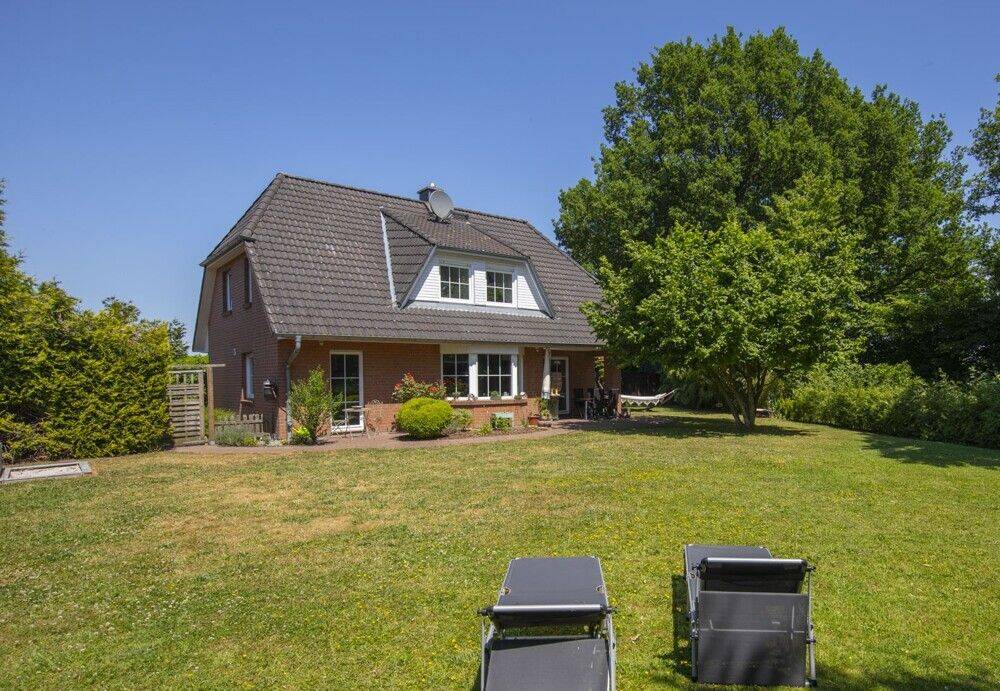 Attraktives 3,5 Zimmer-Einfamilienhaus mit Vollkeller und schönem Garten in Lutzhorn, 25355 Lutzhorn