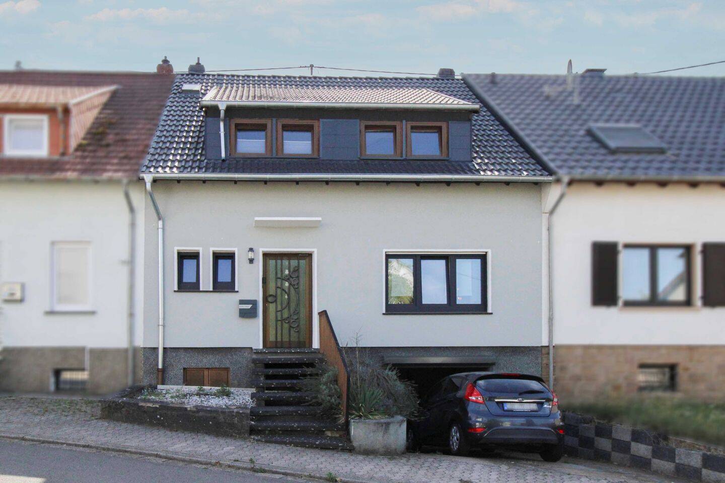 Einziehen, wohlfühlen, draußen genießen – gepflegtes Zuhause mit Garten und Garage in ruhiger Lage, 66346 Püttlingen