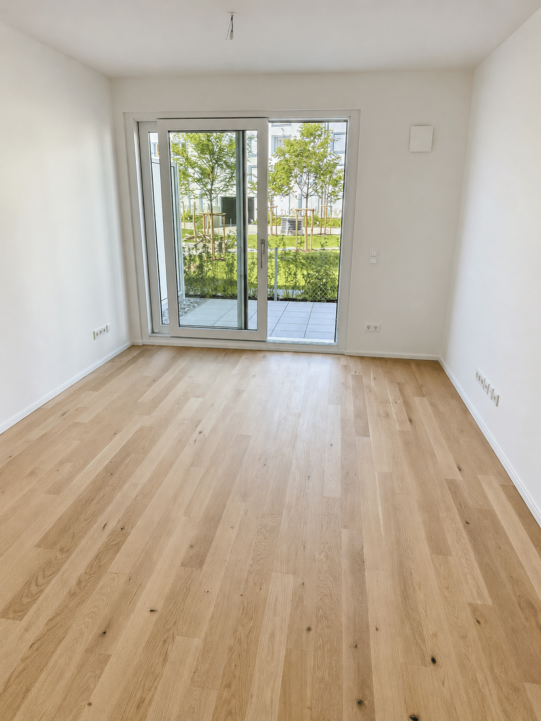 Helle 2-Zimmer-Neubauwohnung mit Terrasse & Grünblick | EBK | Pasing