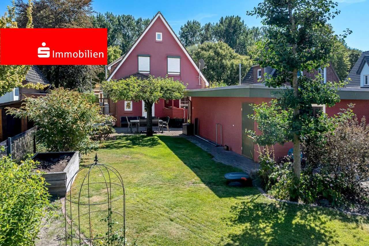 Sehr gepflegtes und energetisch saniertes Einfamilienhaus mit Vollkeller und großer Garage in Elmshorn, 25335 Elmshorn
