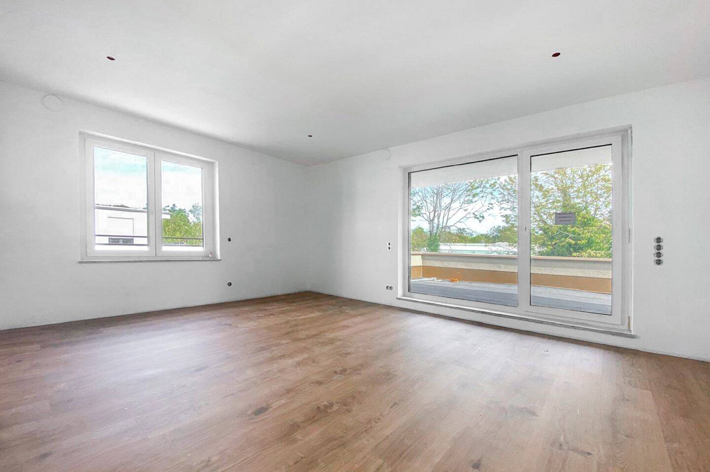 AIGNER – Neubau: Großzügige und lichtdurchflutete 2 – Zimmer Penthouse-Wohnung!