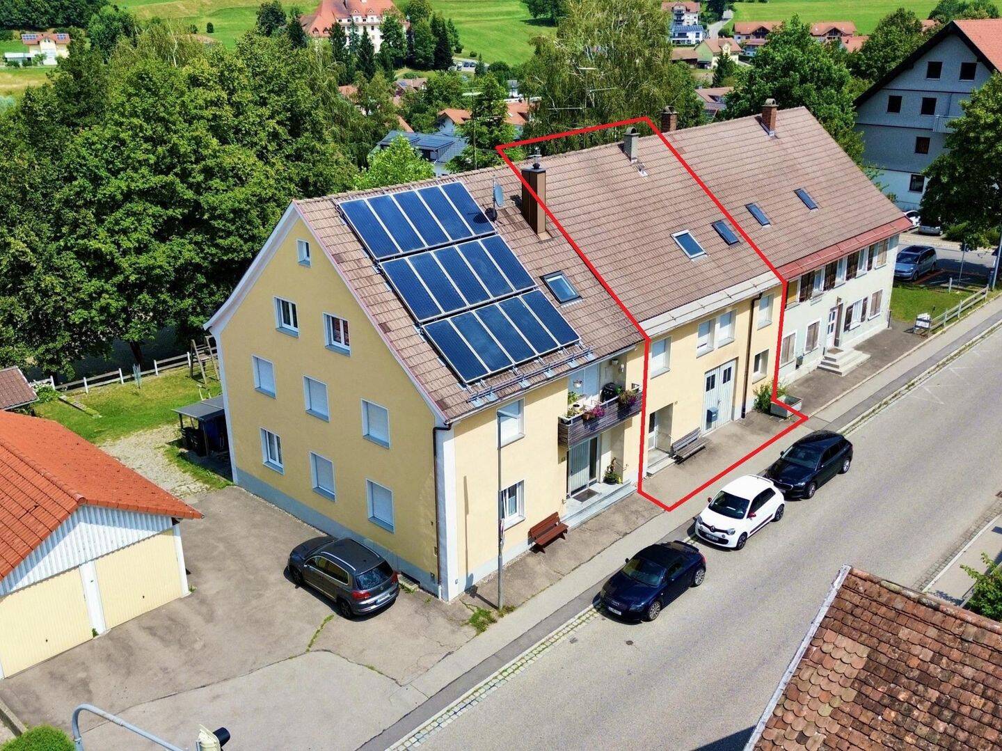 Reihenmittelhaus mit vermieteter Wohnung und Werkstattfläche in Heimenkirch, 88178 Heimenkirch