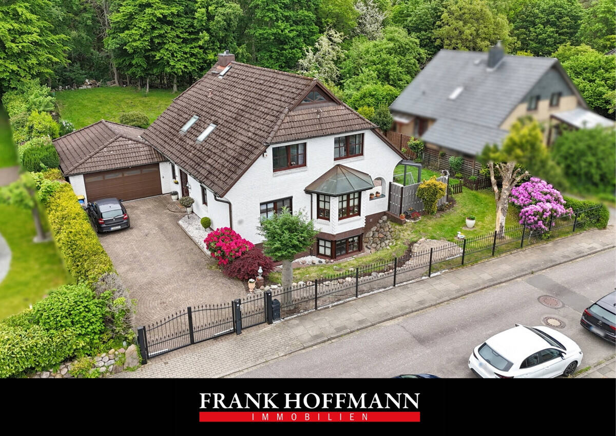Attraktives Einfamilienhaus mit großzügiger Wohnfläche in begehrter Waldrandlage in Quickborn, 25451 Quickborn