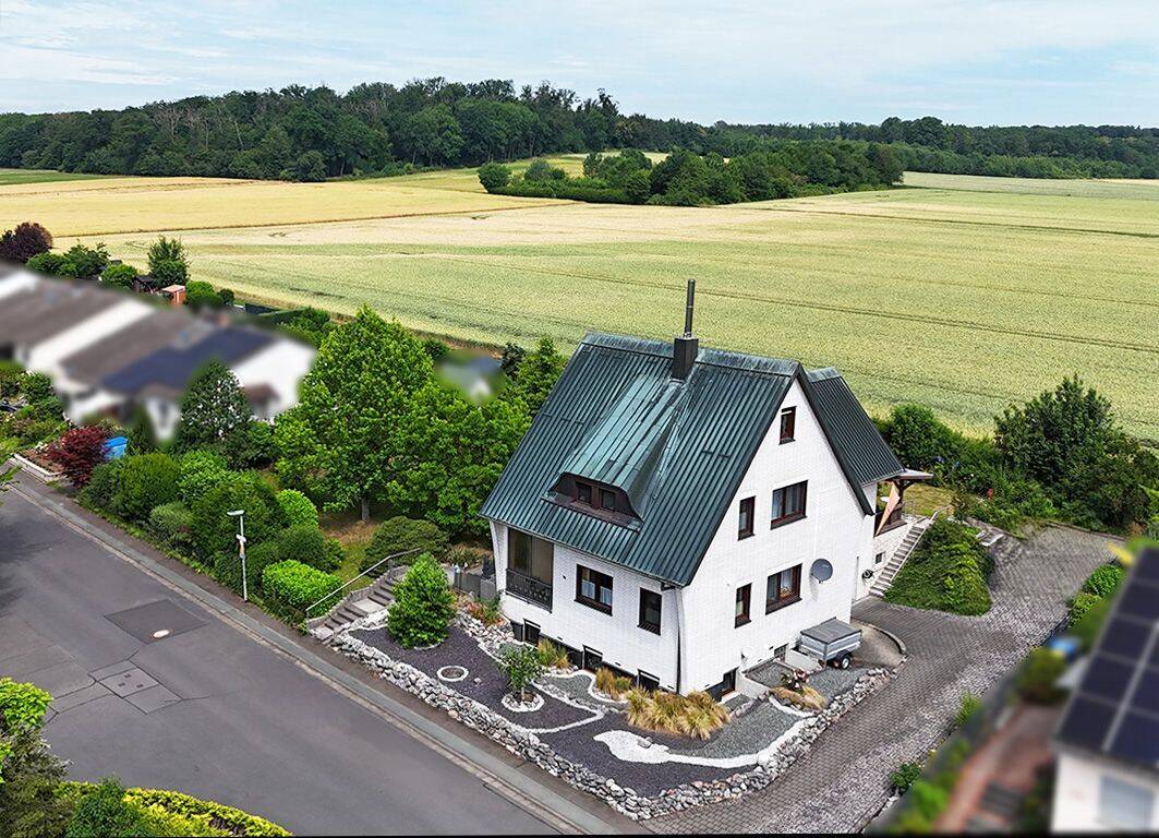 Ihr Zuhause am Feldrand – Großzügiges Einfamilienhaus mit Einliegerwohnung, 35415 Pohlheim