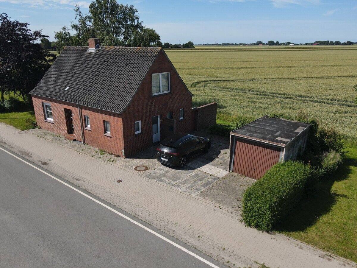 Großzügiges Grundstück mit Einfamilienhaus und Blick ins Grüne – Provisionsfrei!, 26831 Bunde