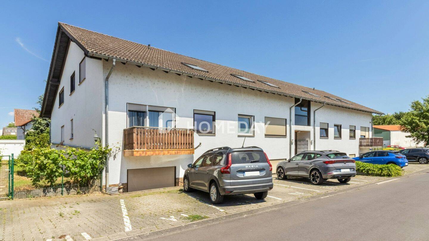 Gepflegte Drei-Zimmer-Erdgeschosswohnung mit zwei Stellplätzen und idyllischem Gemeinschaftsgarten, 35423 Lich