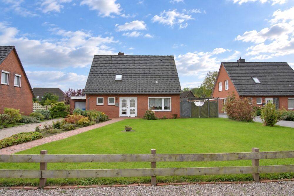 Solides Einfamilienhaus mit Wintergarten und schönem Grundstück in ruhiger Wohnlage, 25774 Lunden